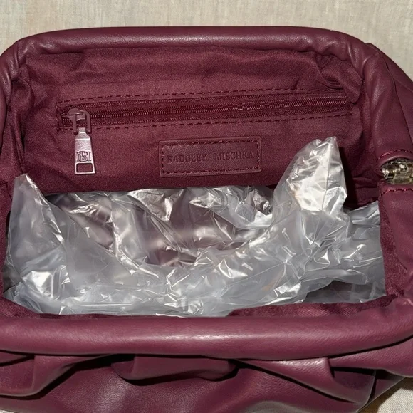 NWT Badgley Mischka Wrapped Frame Clutch: Plum
Perfect fall bag - Picture 9 of 9